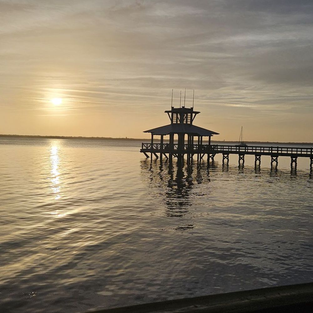 Move-in cleaning checklist in Clay County, FL—peaceful waterfront pier at sunset in Fleming Island, representing a fresh start in a new home with professional cleaning services typically costing $200–$400 for a 2–3 bedroom house, ensuring a sanitized and move-in ready space.