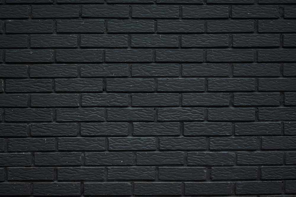 Mental blocks and psychological barriers—dark brick wall representing obstacles that prevent clear thinking, creativity, and progress, symbolizing the internal challenges individuals in Jacksonville and surrounding areas face when dealing with stress, decision-making, and personal growth.